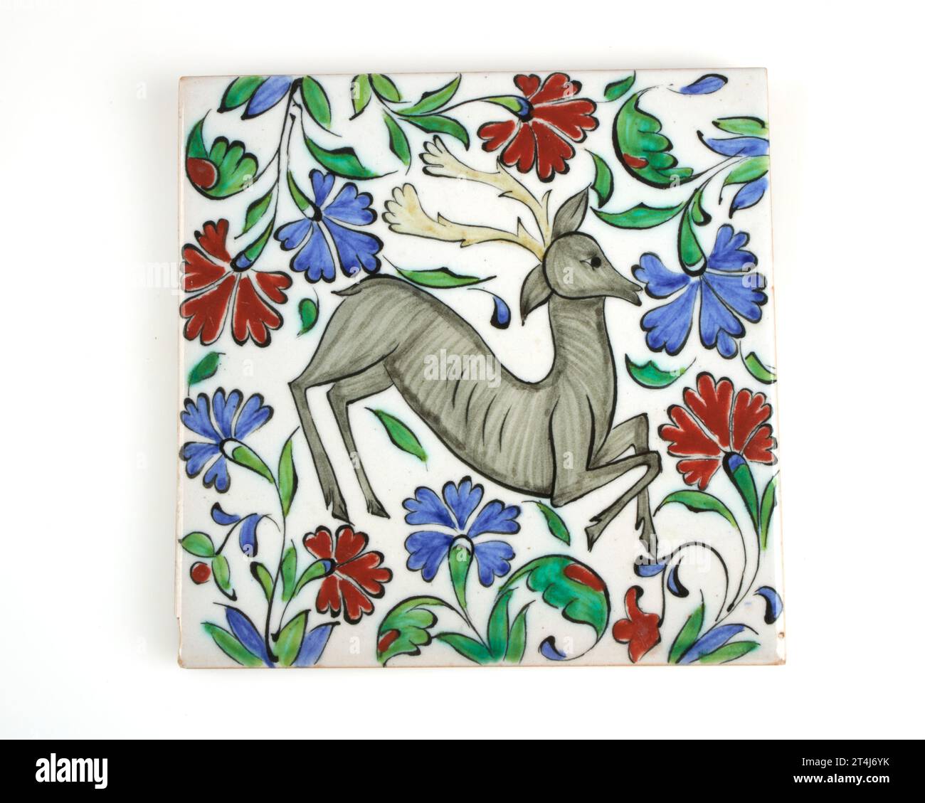 Vintage 1960s Ikaros Pottery, Greece hand painted stag deer tile. no.2 Stock Photo
