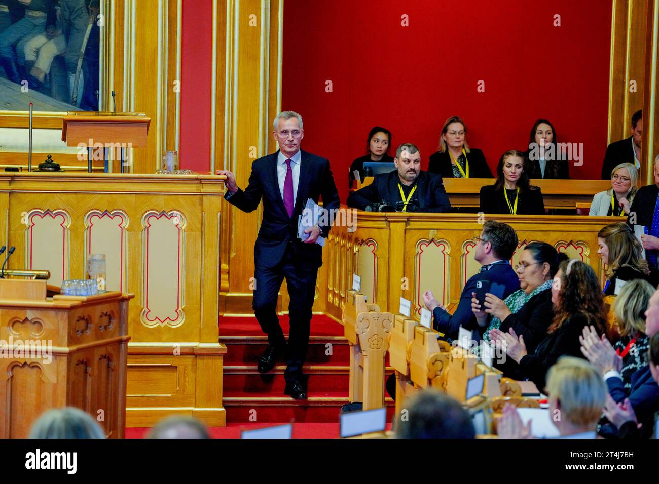 NATO Secretary General Jens Stoltenberg is applauded after delivering ...