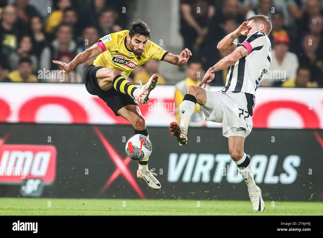 Athens, Greece. 30th Oct, 2023. AEK's Milad Mohammadi (Left) and PAOK's Kiril Despodov (Right) in action during a Greek Superleague match between AEK FC and PAOK FC. (Credit Image: © Giannis Papanikos/ZUMA Press Wire) EDITORIAL USAGE ONLY! Not for Commercial USAGE! Stock Photo
