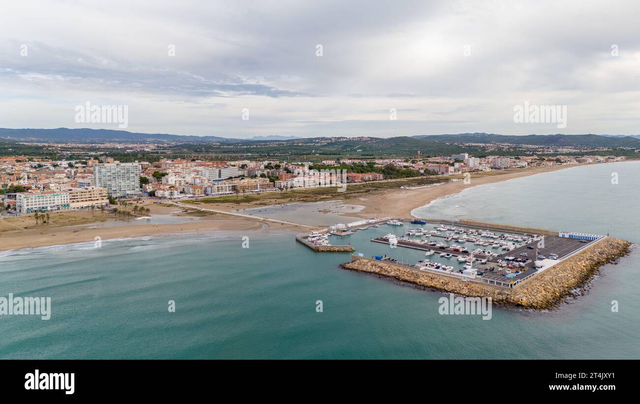 Aerial drone photo of the marina in the Spanish coastal town named Coma ...