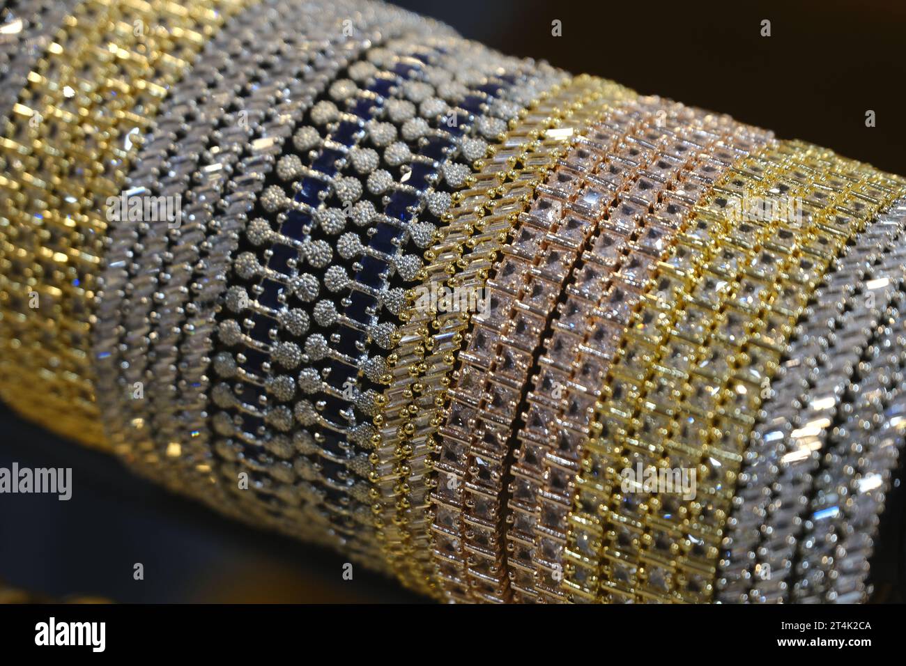 Indian Gold bangles displayed in local shop in a market of Pune, India ...