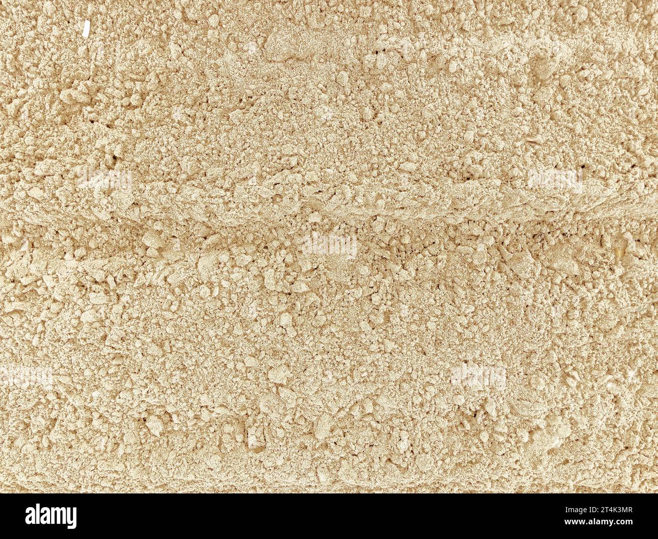 yellow sand texture from sand pile background Stock Photo