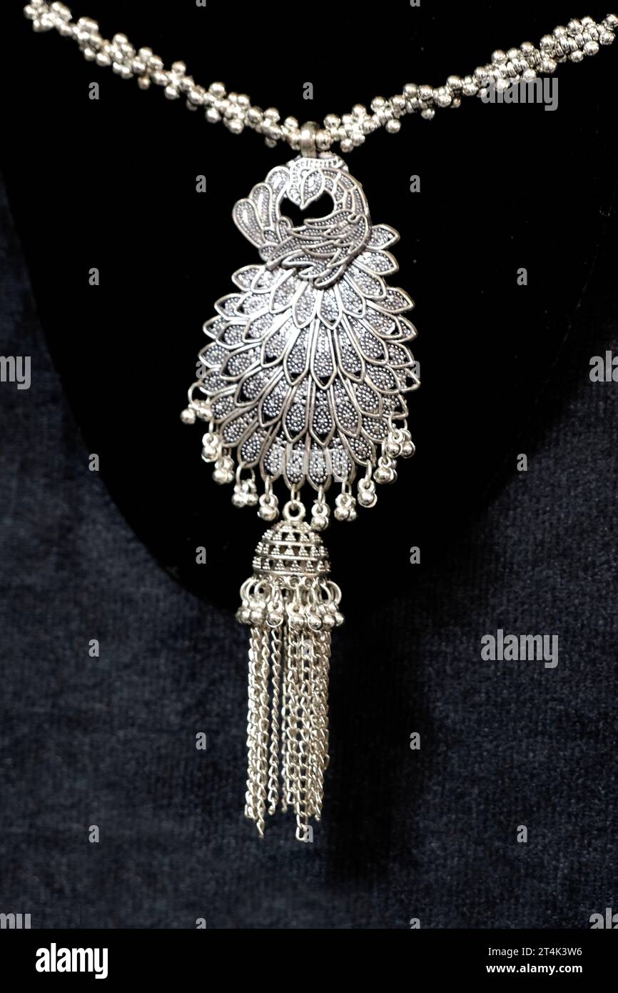 colorful traditional indian jewelry displayed in a street shop for sale