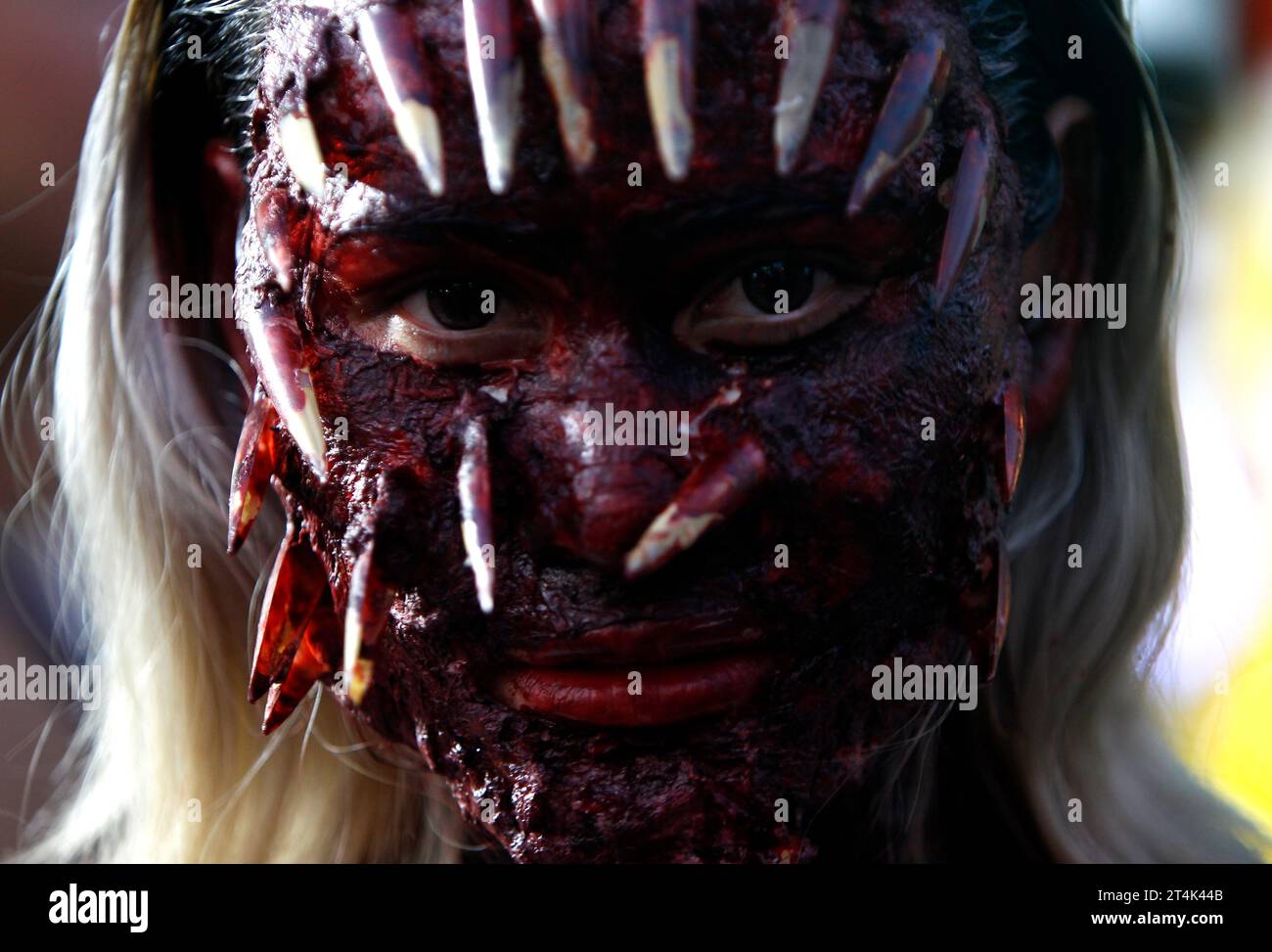 Bangkok, Thailand. 31st Oct, 2023. A woman with Halloween make-up poses for photos during Halloween celebrations at popular tourist street Khaosan Road in Bangkok. (Photo by Chaiwat Subprasom/SOPA Images/Sipa USA) Credit: Sipa USA/Alamy Live News Stock Photo