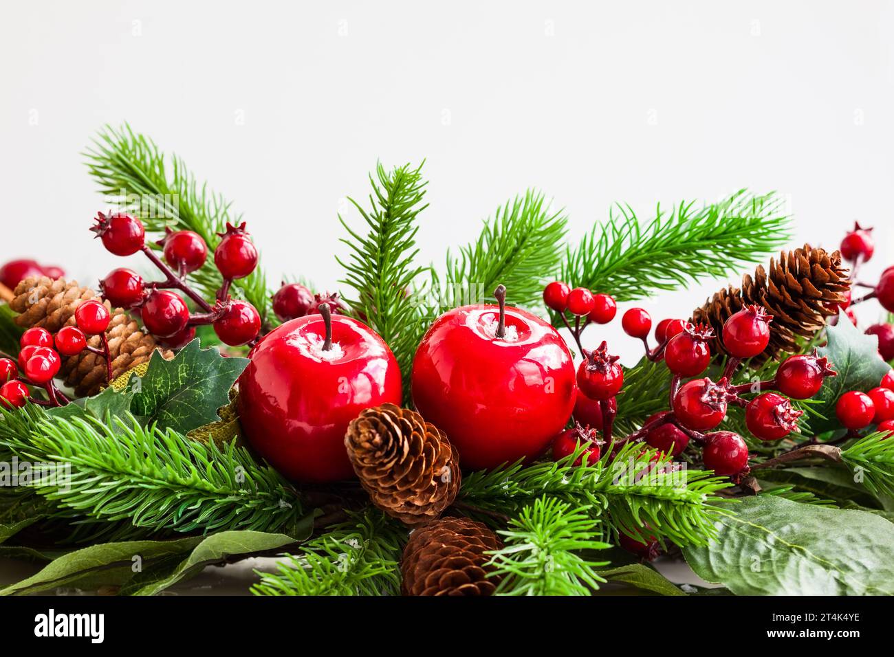 Pine fir cones holly berries hi-res stock photography and images - Alamy