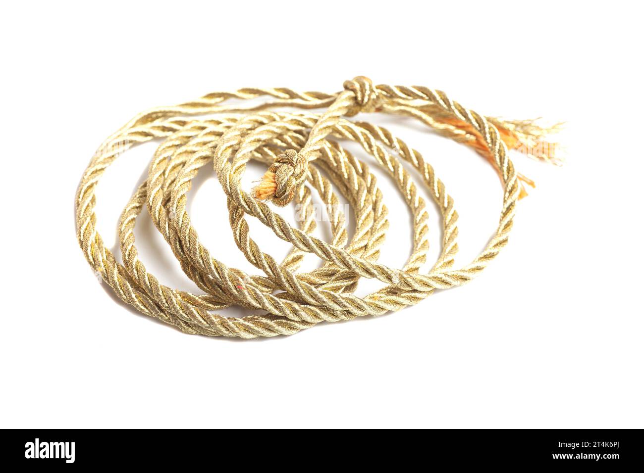 Golden rope isolated on a white background. Stock Photo