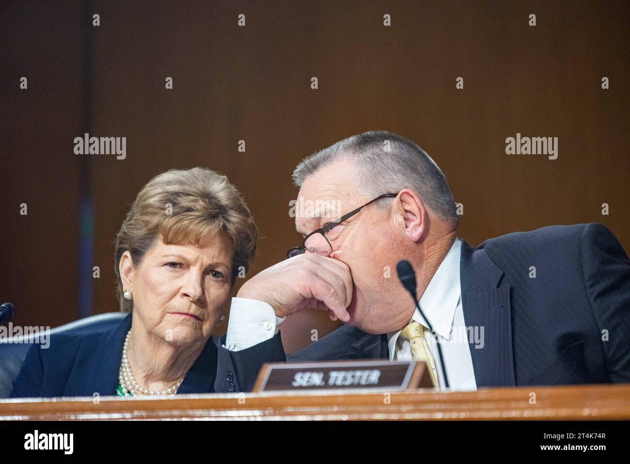 United States Senator Jeanne Shaheen Democrat of New Hampshire and United States Senator Jon Tester Democrat of Montana talk at a Senate Appropriations Hearing to examine the national security supplemental request in the Dirksen Senate Office Building in Washington, DC on Tuesday, October 31, 2023. Copyright: xAnnabellexGordonx/xCNPx/MediaPunchx Credit: Imago/Alamy Live News Stock Photo