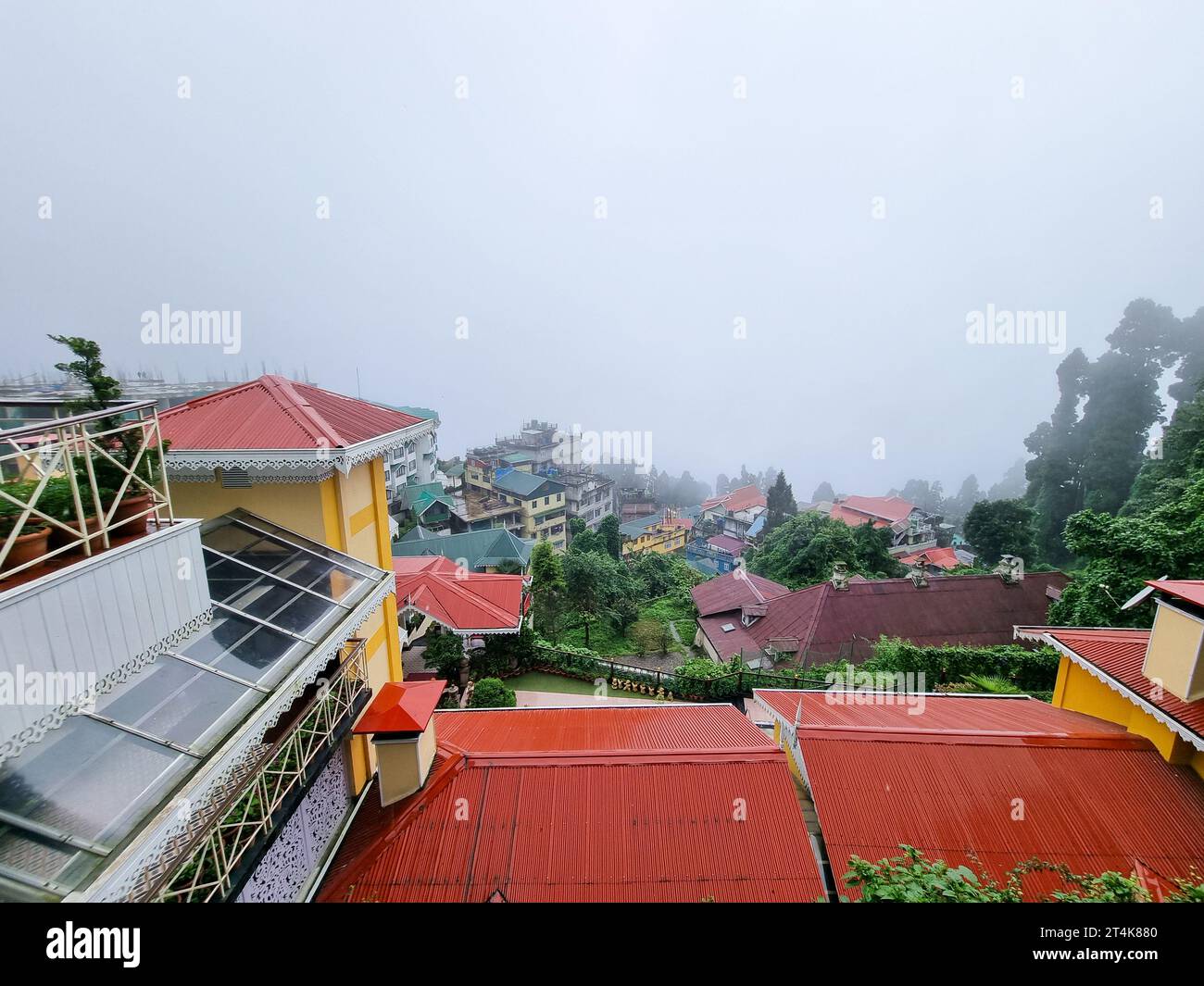 colorful houses with glass skylights, sloping roofs for snow placed on