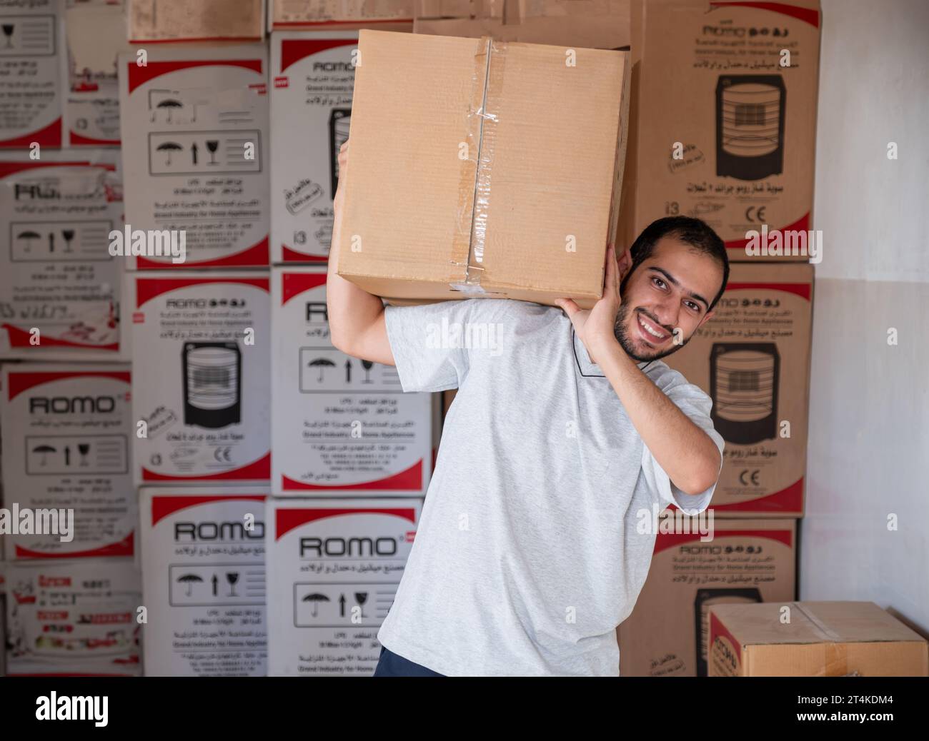 male holding package to be sent for war places and help poverty in