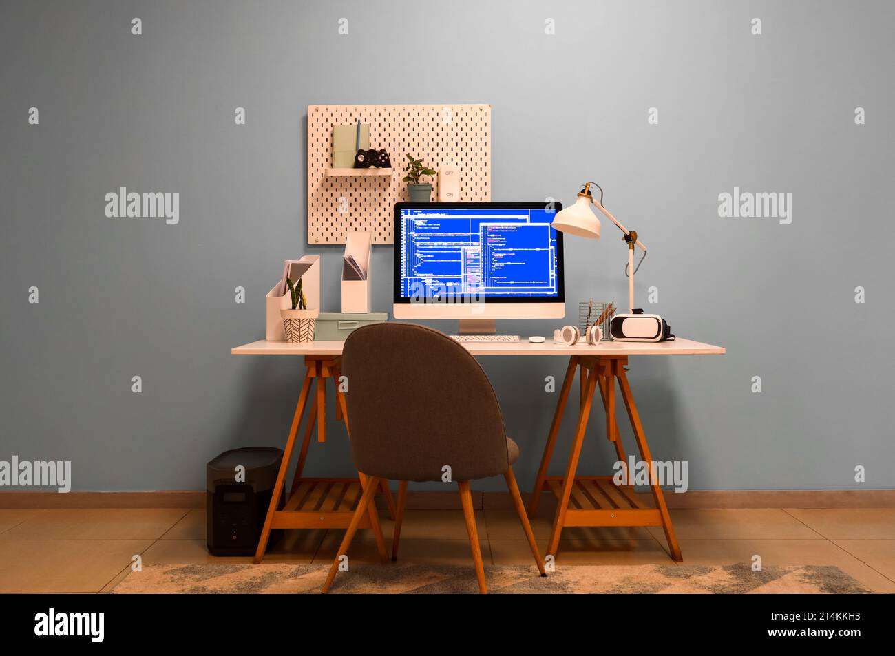Interior of office with programmer's workplace and pegboard Stock Photo ...