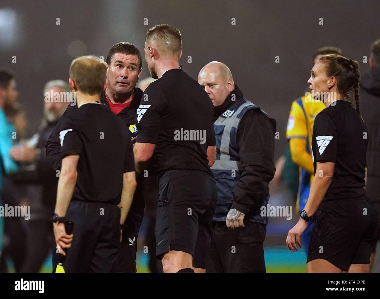 Mansfield Town manager Nigel Clough addresses the officials following