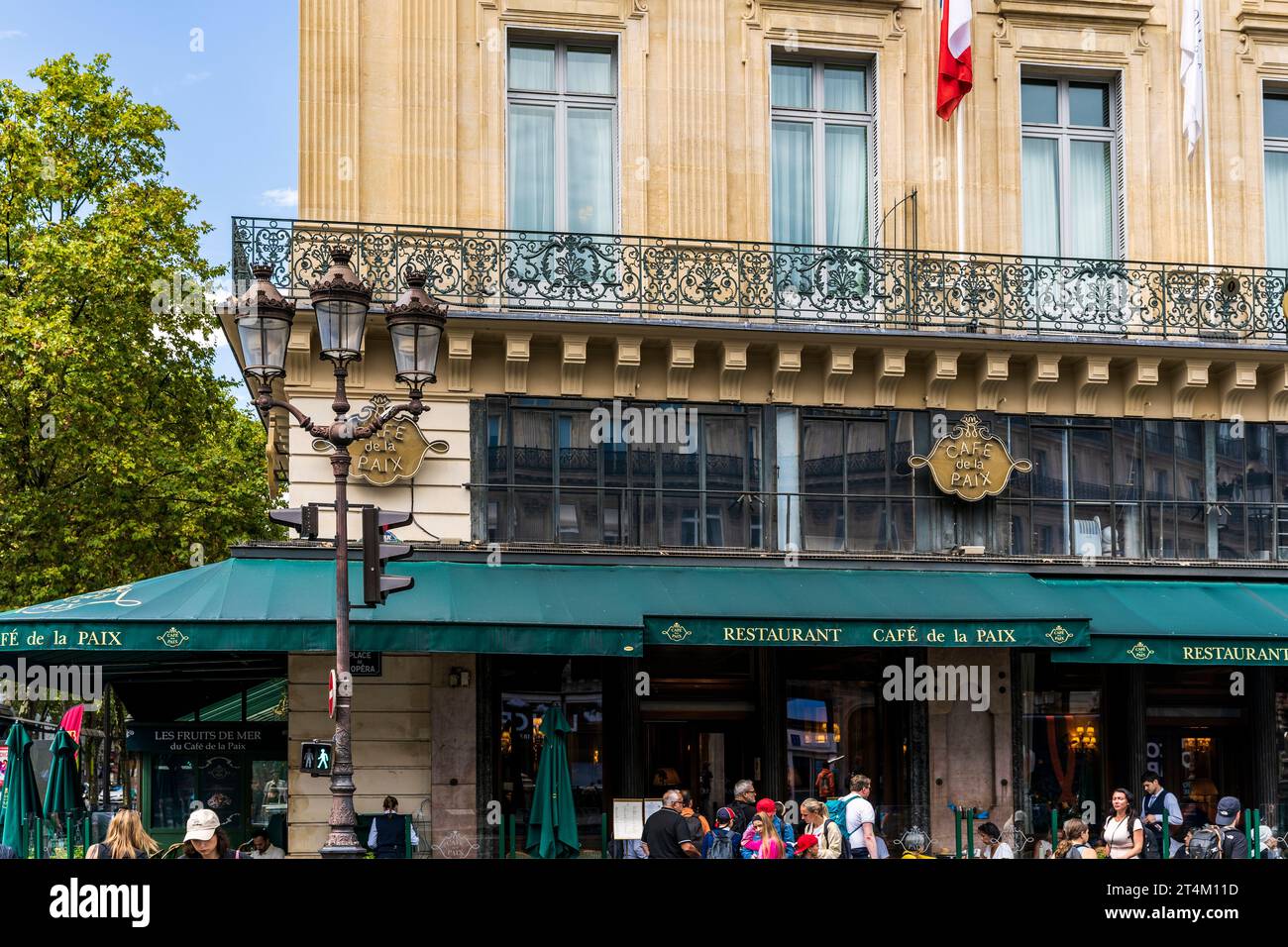 The façade of Café de la Paix, famous Parisian café and restaurant in place de l'Opéra, Paris city center, France Stock Photo