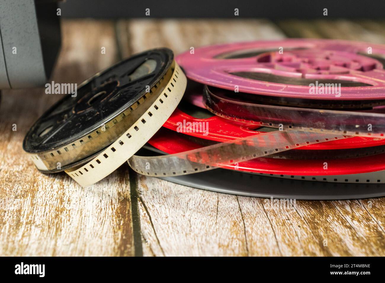 colorful rolls of old cinema films stacked Stock Photo
