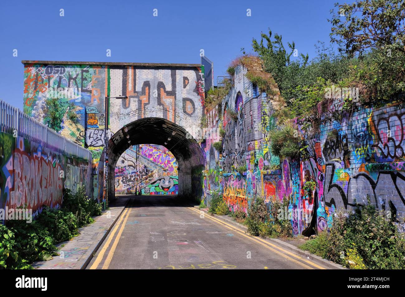 Colourful street art and graffiti in Fleet Street Hill near Brick Lane and Spitalfields, Tower Hamlets, London, England, UK Stock Photo