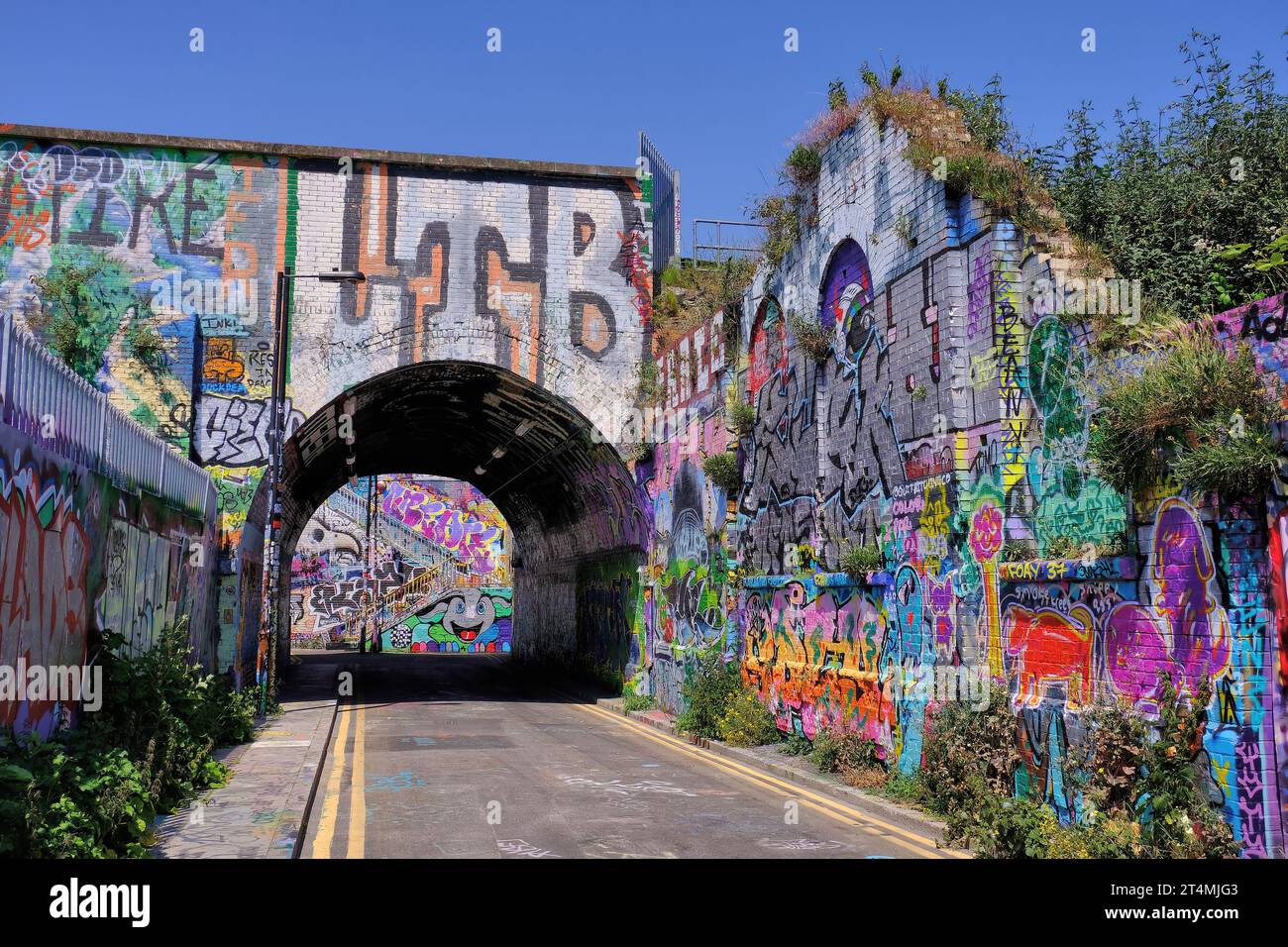 Colourful street art and graffiti in Fleet Street Hill near Brick Lane and Spitalfields, Tower Hamlets, London, England, UK Stock Photo