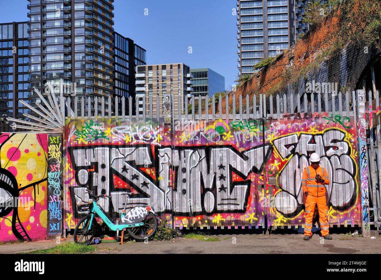 Colourful street art and graffiti in Braithwaite Street near Brick Lane
