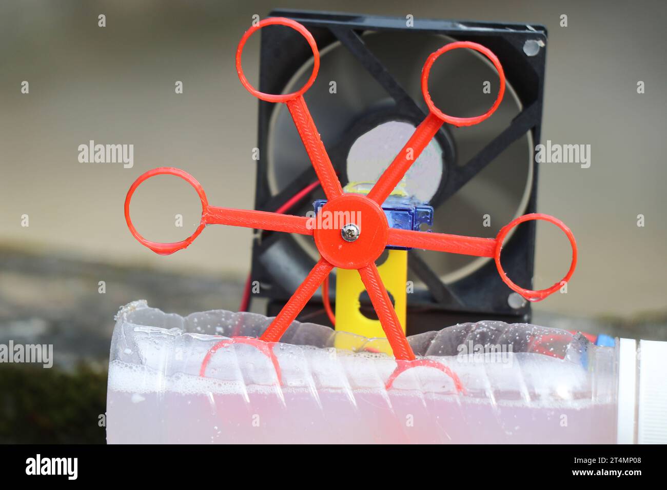 Automatic soap bubble blowing machine made with 3D printed parts built at home close up view Stock Photo