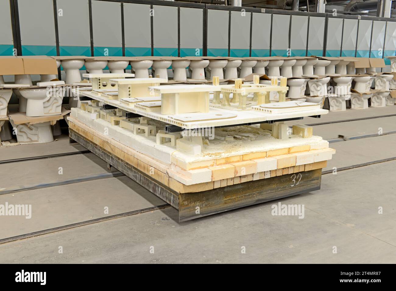 ceramic sintering production line in a factory, closeup of