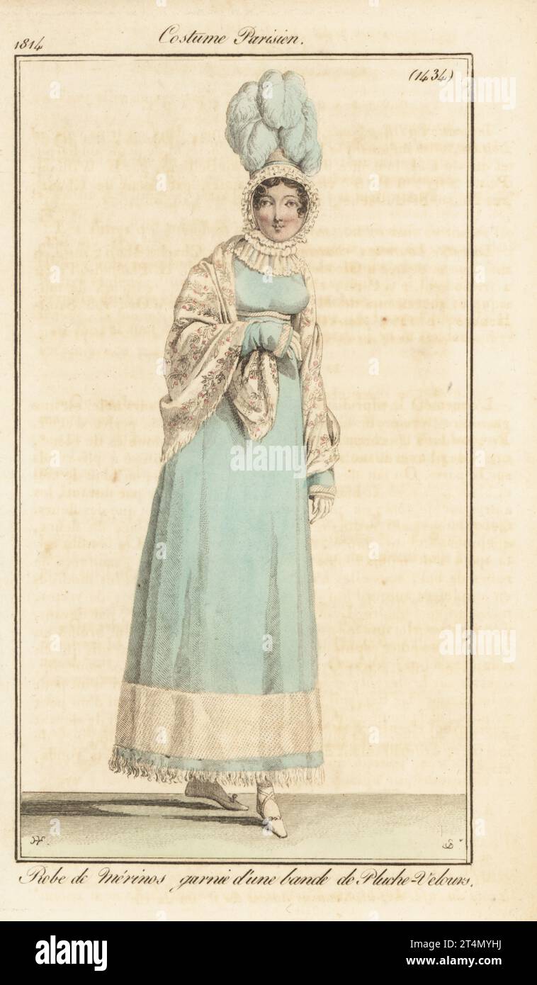 Fashionable woman in plumed bonnet, Merino wool dress decorated with a band of velveteen, embroidered shawl. Robe de merinos garni d'une bande de pluche-velours. Handcoloured copperplate engraving by Jean Charles Baquoy after a fashion plate by Horace Vernet from Pierre de la Mesangere’s Journal des Dames et des Modes, Magazine of Women and Fashion, Paris, 1814. Stock Photo