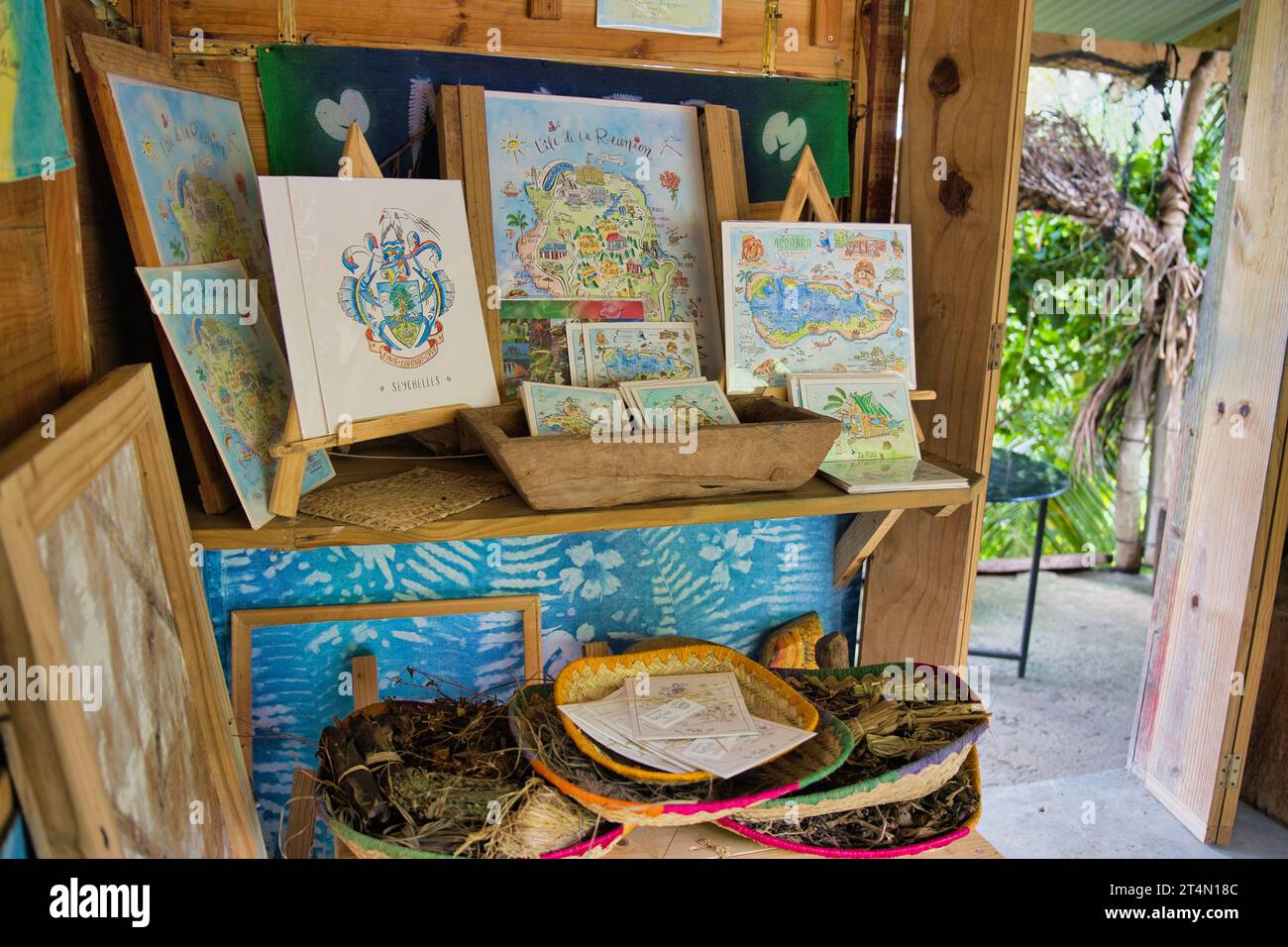 Roots Seychelles, illustration maps in their boutique at their workshop, Mahe Seychelles Stock Photo