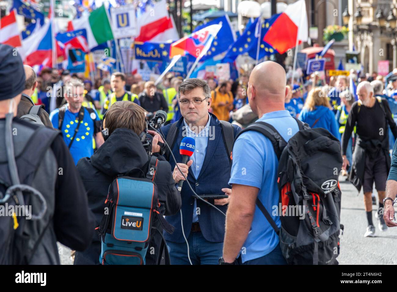 Ray Addison reporting for GB News in front of National Rejoin March II in London, UK. Protest rally campaigning for UK to re-join the European Union Stock Photo