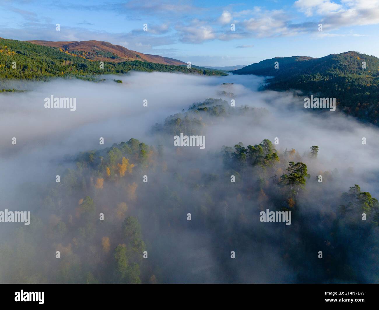 Aerial views of autumnal colours over Loch Beinn a Mheadhoin with early morning cloud inversion in Glen Affric, Highland Region, Scotland UK Stock Photo