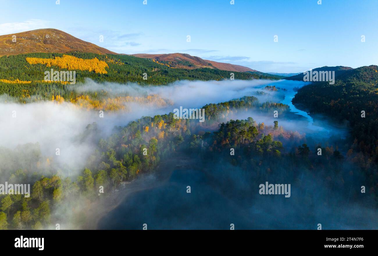 Aerial views of autumnal colours over Loch Beinn a Mheadhoin with early morning cloud inversion in Glen Affric, Highland Region, Scotland UK Stock Photo
