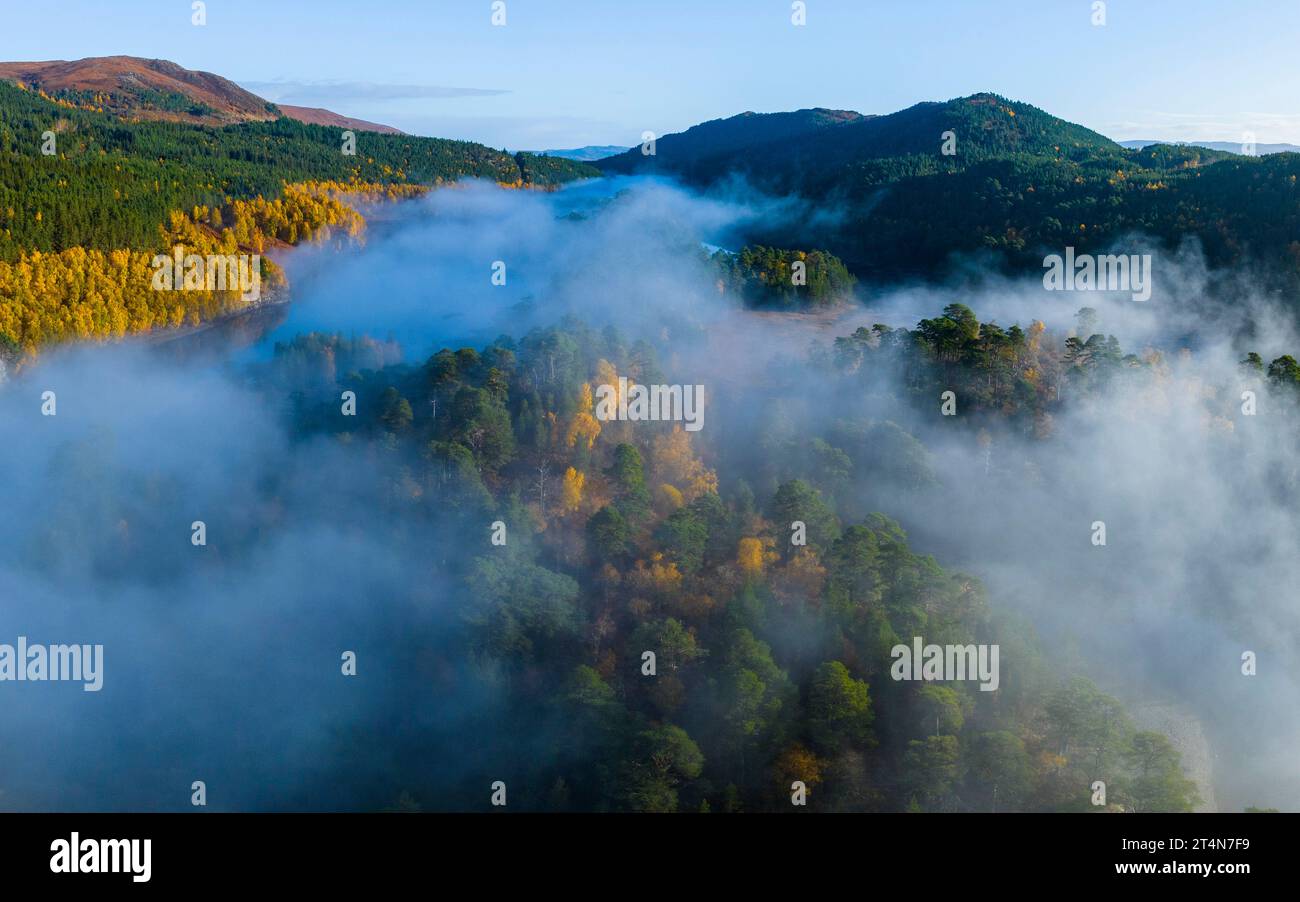 Aerial views of autumnal colours over Loch Beinn a Mheadhoin with early morning cloud inversion in Glen Affric, Highland Region, Scotland UK Stock Photo