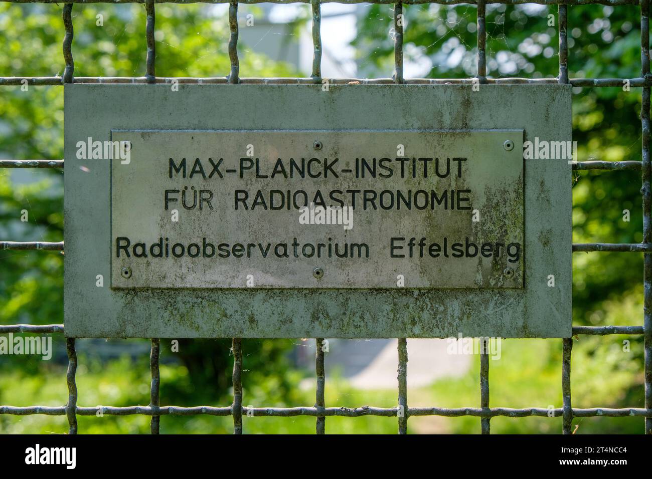 Signage at the fence of the Max-Planck-Institut für Radioastronomie (institute for radio astronomy) in Effelsberg, Germany Stock Photo