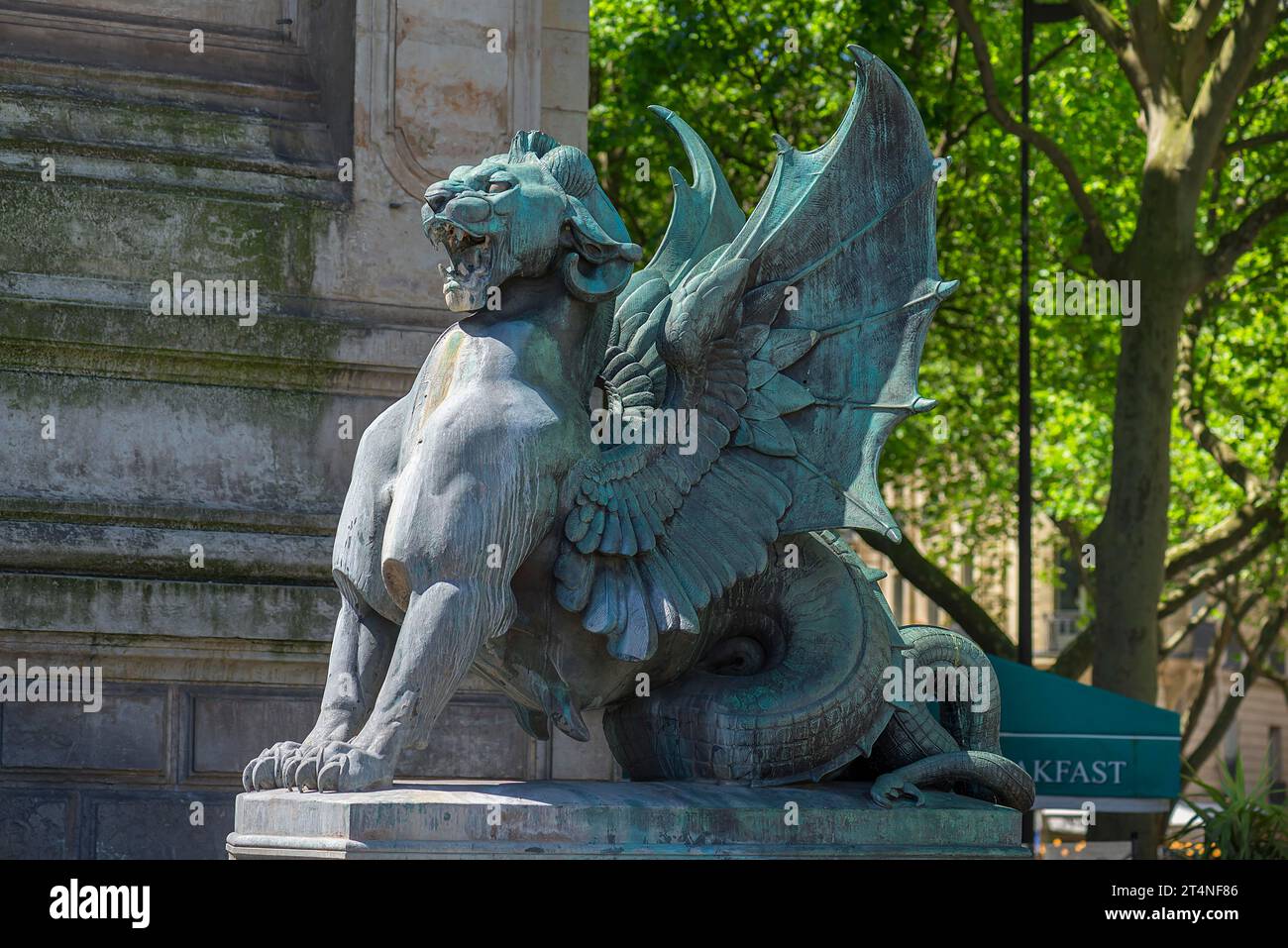 Fantasy figure at the Saint Michael Fountain by architect Gabriel Davioud, Place Saint-Michel, Paris, France Stock Photo