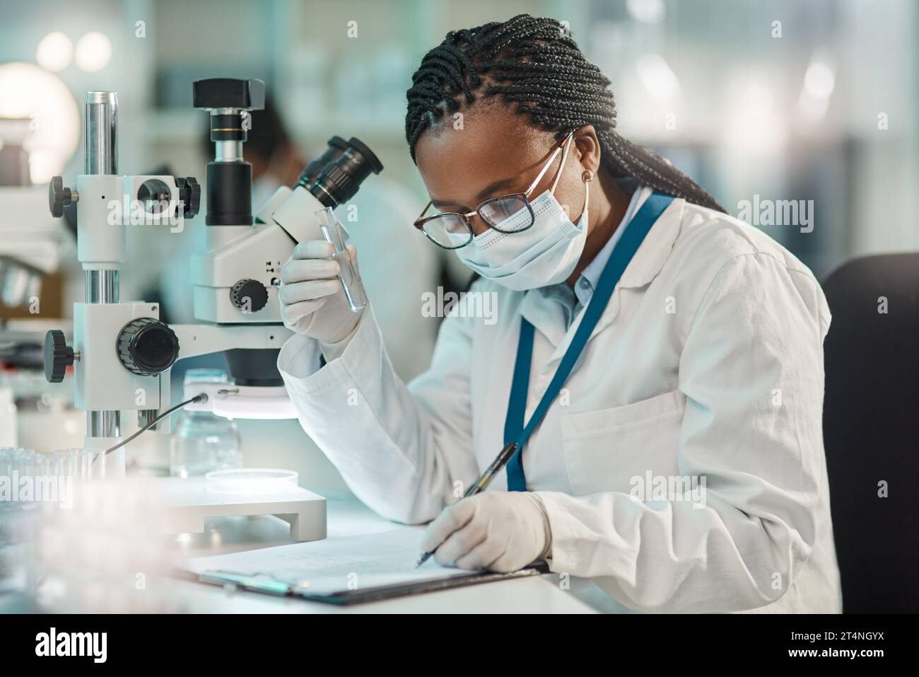Person Writing Lab Notes After writing notes lab scientist hi-res stock photography and images ...
