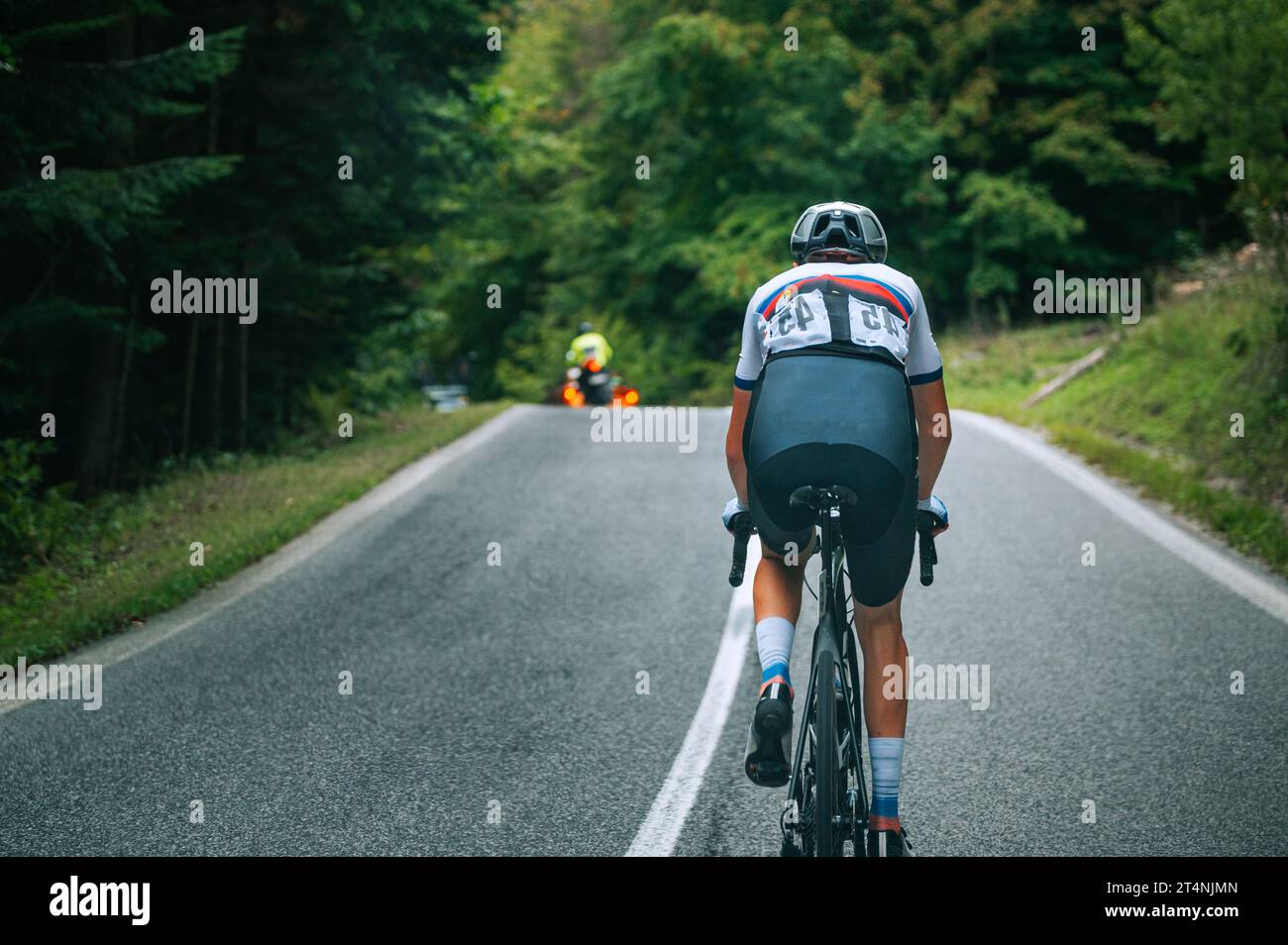 Summer Cycling in the French Countryside: A Snapshot of a Pro Cyclist's Journey. Scenic Sports Photography with a Blur-Enhanced Twist Stock Photo