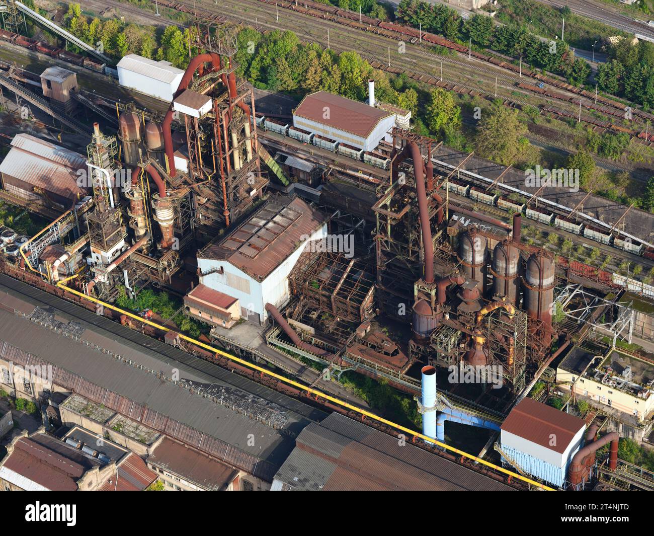 AERIAL VIEW. The blast furnaces at the abandoned steel mills of Hayange. Moselle, Lorraine, Grand Est, France. Stock Photo