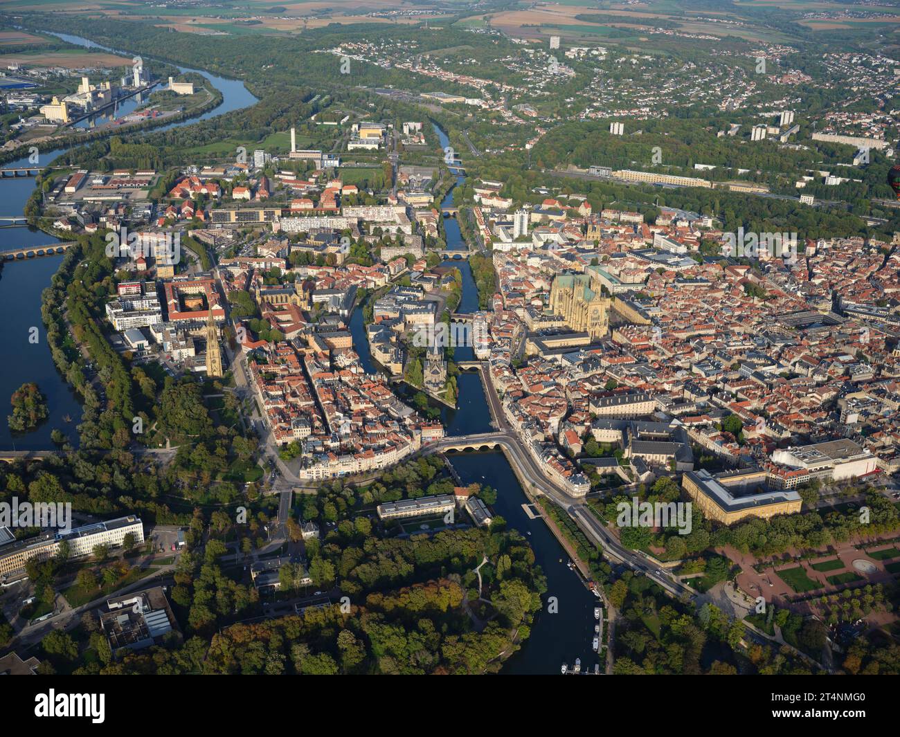 AERIAL VIEW. The city center of Metz on the banks of the Moselle River. Grand Est, France. Stock Photo