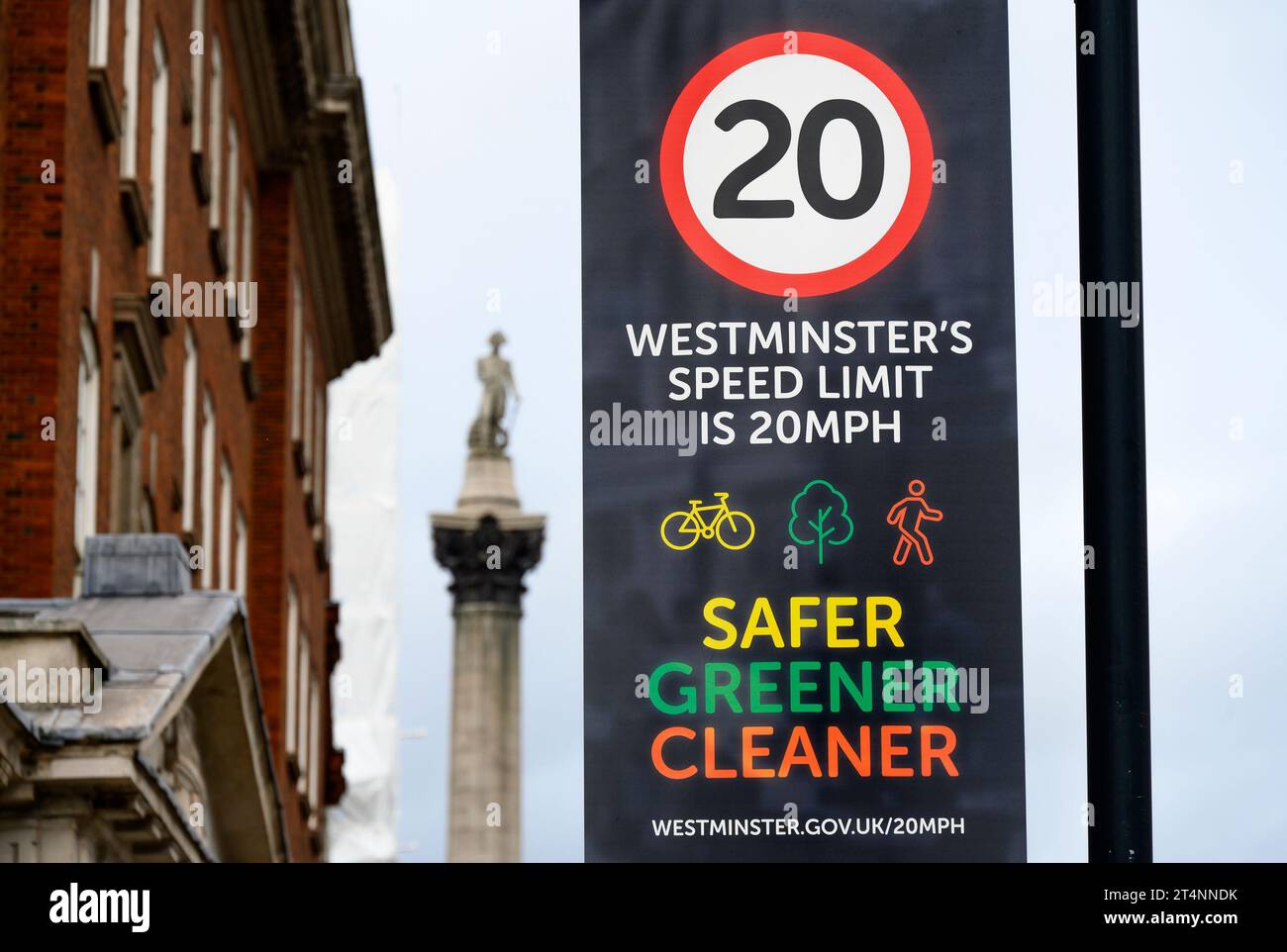 London, UK. 20 mph zone in Whitehall, Westminster - Nelson's Collumn behind Stock Photo