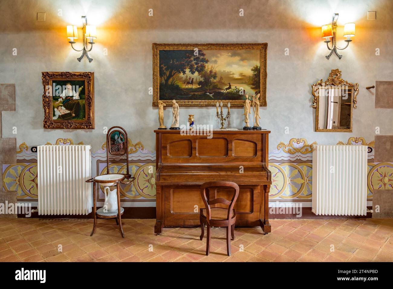 Private apartment with classic decoration, in which the family that owns the Mas Postius rural house resides, in Muntanyola (Osona, Barcelona, Spain) Stock Photo