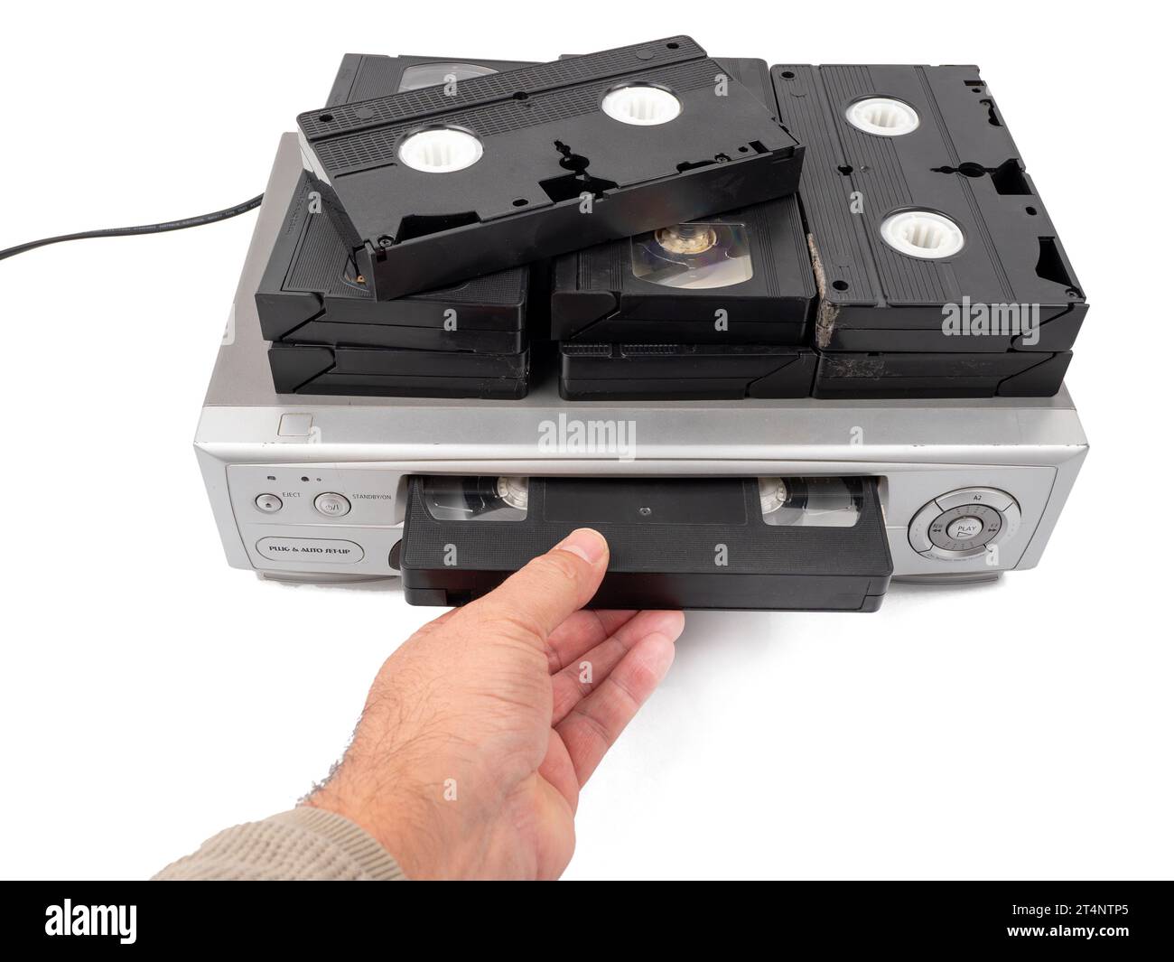 VHS cassette video recorder on a white background. Retro video recorder