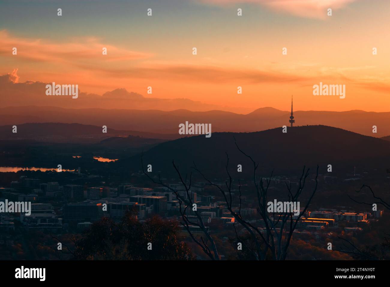Canberra Civic At Dusk, View from Mount Ainslie, City landscape at Dusk with Telstra Tower in the distance Stock Photo