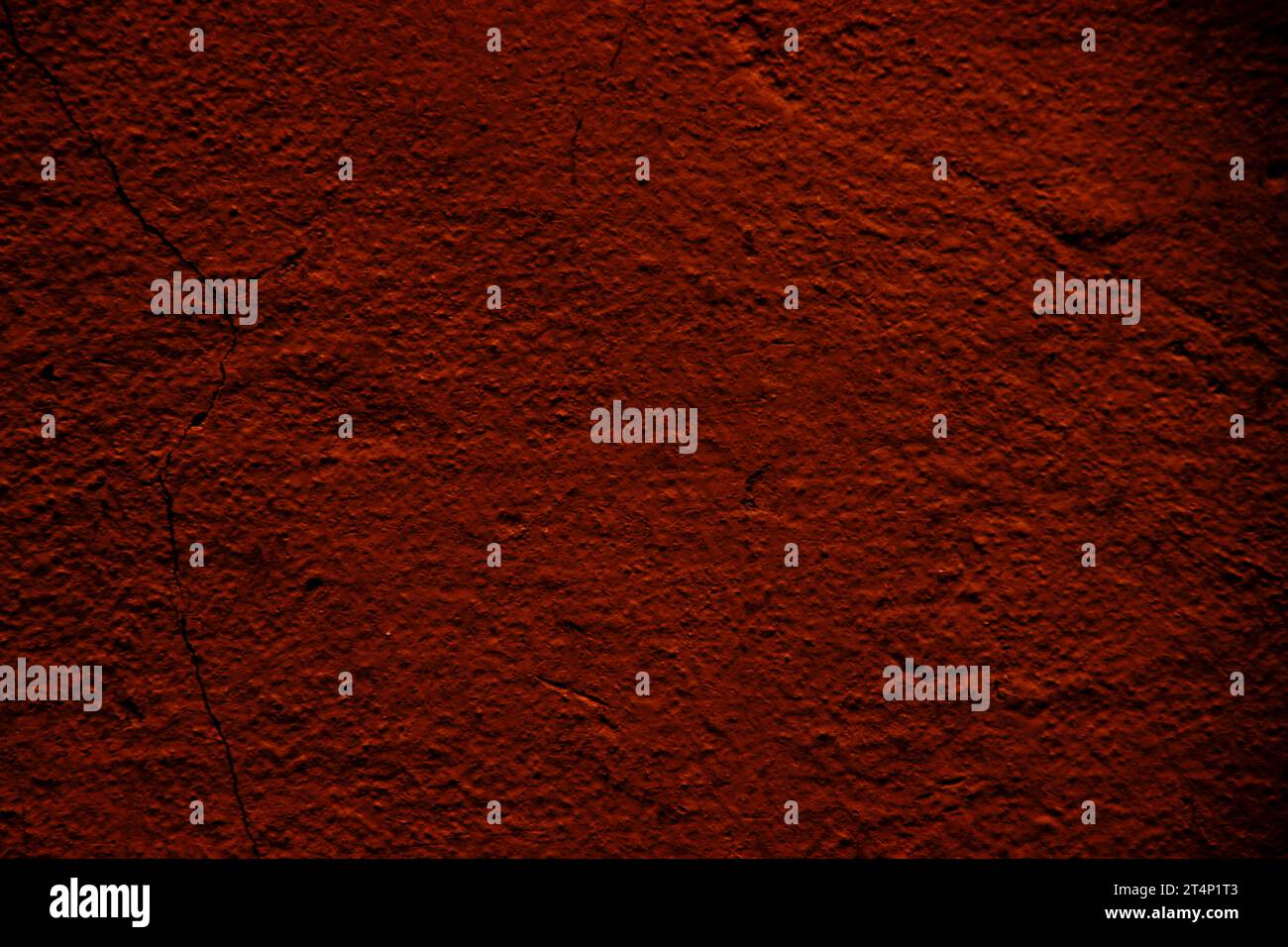 Crimson red colored abstract wall background with textures of different