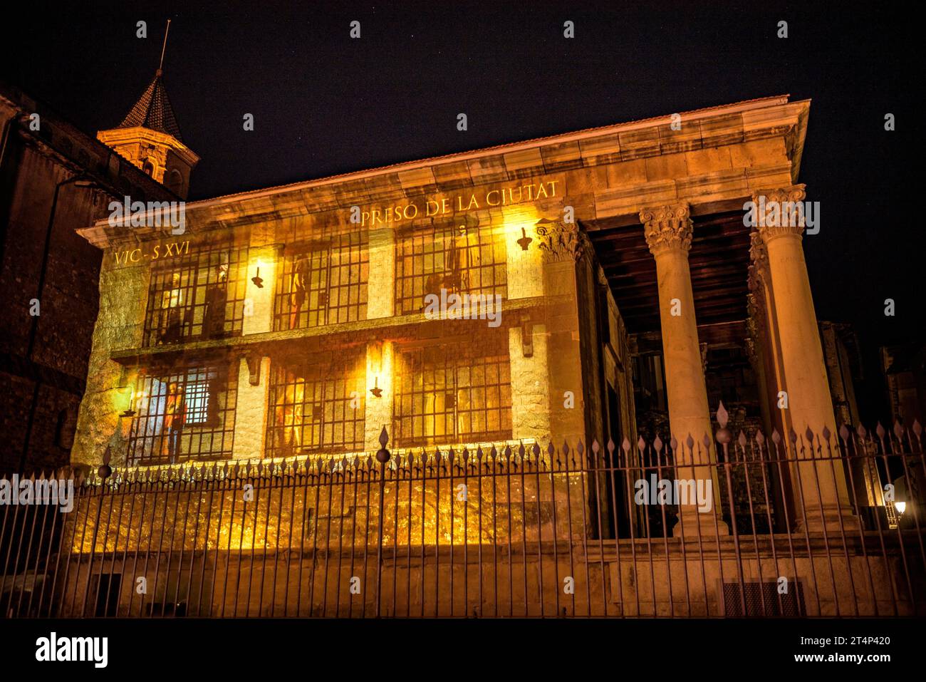 Video Mapping on the side facade of the Roman temple of Vic (Osona, Barcelona, Catalonia, Spain) ESP: Video Mapping en la fachada del templo de Vic Stock Photo