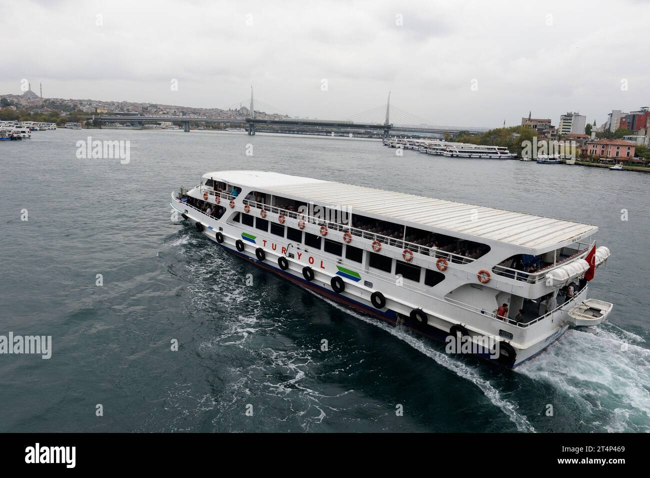 Istanbul, Türkiye. Passenger boat on the Golden Horn. In the background ...