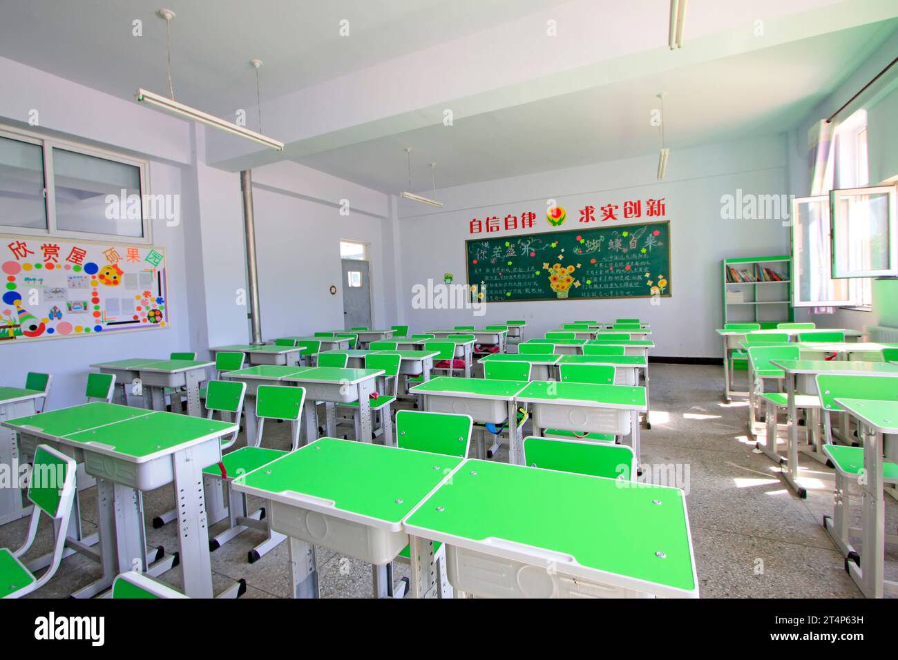 Desks and chairs in the primary school classroom, China Stock Photo