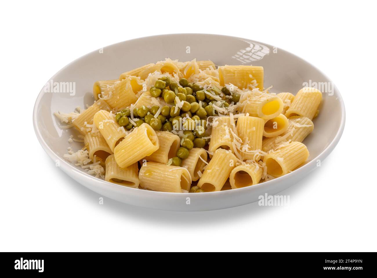 Mezze maniche macaroni with peas and olive oil sauce with grated parmesan cheese in white plate isolated on white, clipping path included Stock Photo