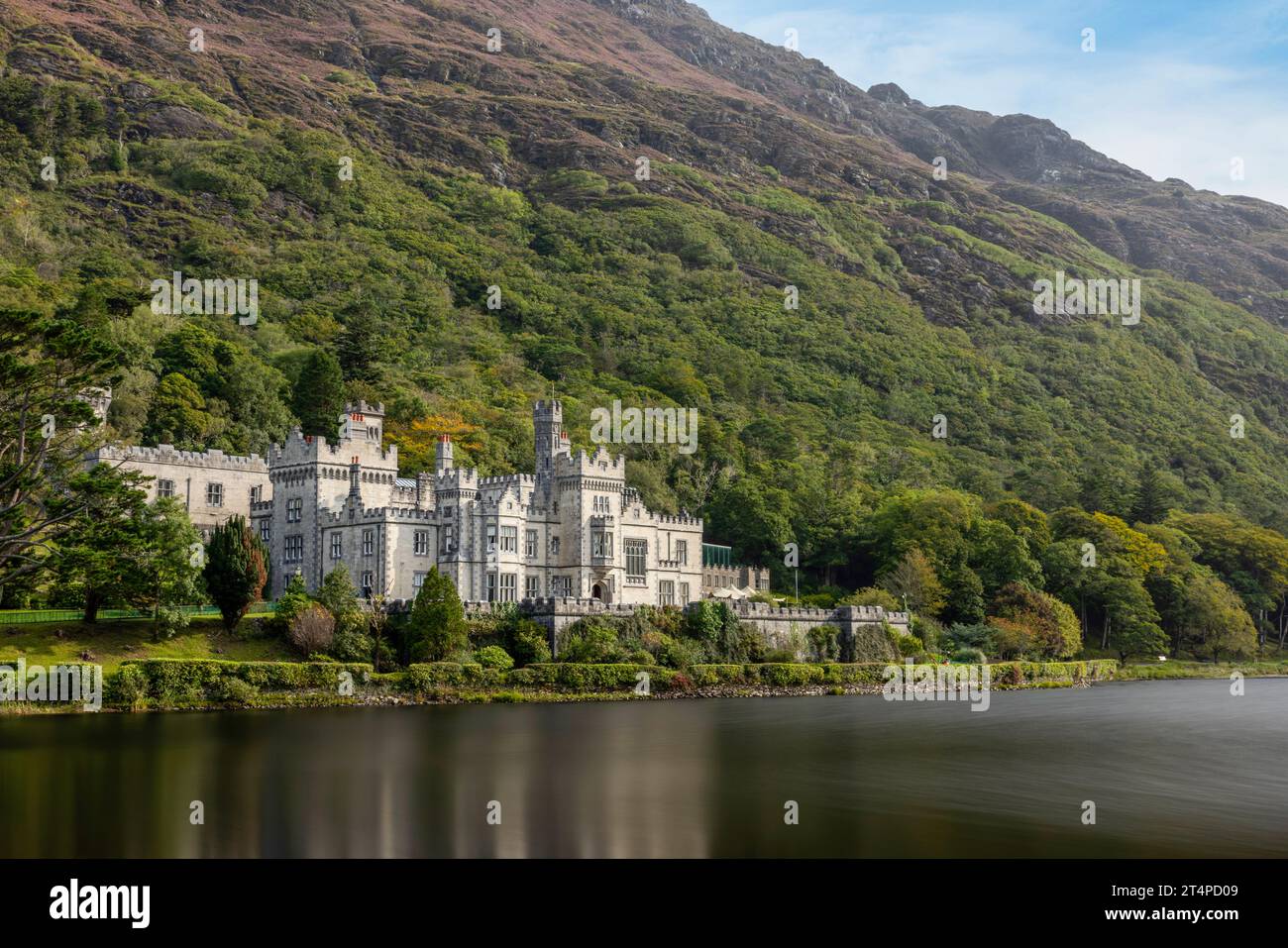 Kylemore Abbey is a 19th-century Benedictine monastery with Gothic Revival architecture and Victorian walled gardens in Connemara, Ireland. Stock Photo