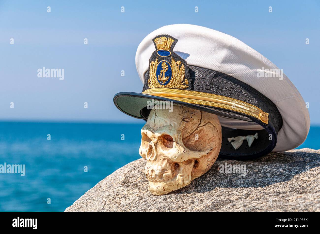 Composition of fake skull with hat of the Italian merchant navy Stock Photo