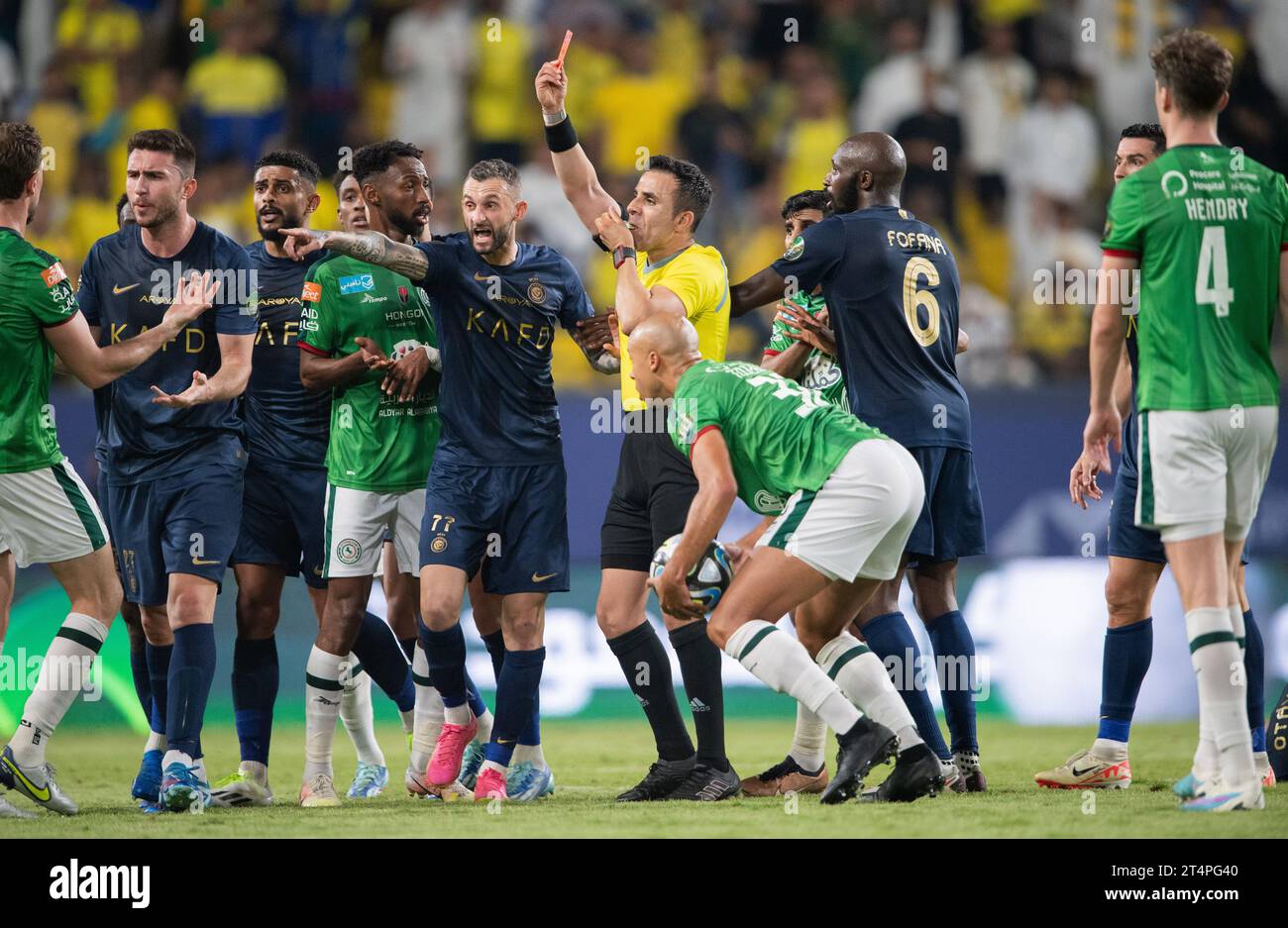 Referee shows red car to Ali Hazazi of Al Ettifaq FC during their Round 16 of the SAFF Saudi Arabia KingÕs Cup 2023-24 match between Al Nassr FC and Al Ettifaq FC at Al Awwal Park Stadium on October 31, 2023 in Riyadh, Saudi Arabia. Photo by Victor Fraile / Power Sport Images Stock Photo