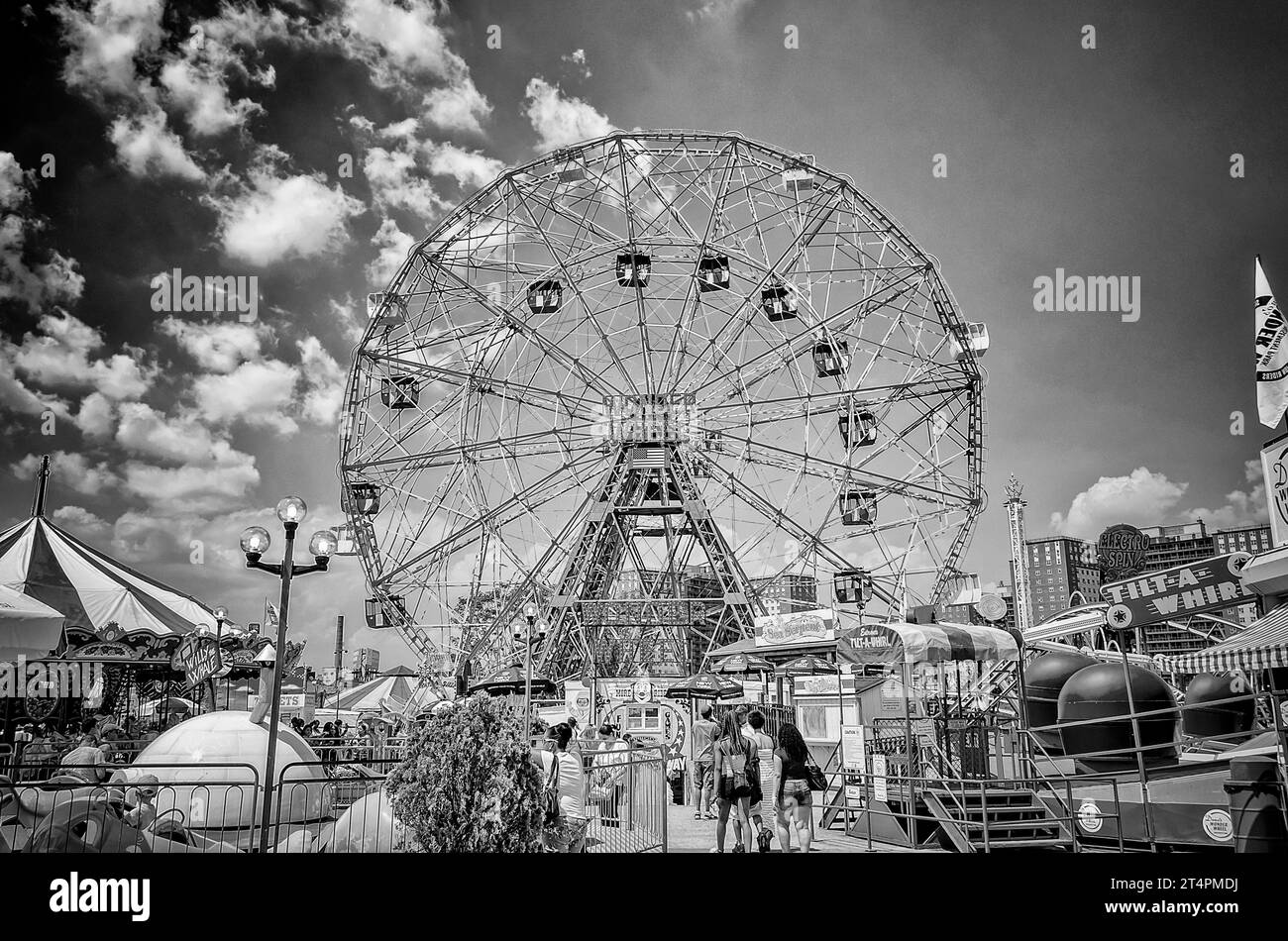 CONEY ISLAND - MAY 30: The famous Wonder Wheel in Coney Island, May 30, 2013. The Eccentric Ferris Wheel was built in 1920, it has 24 fully enclosed c Stock Photo