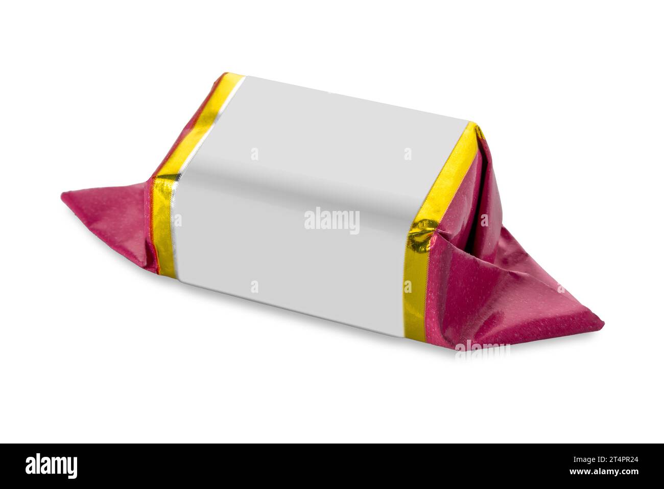 Fold-wrapped candy with gold and white purple paper, isolated on white with clipping path included. Copy space Stock Photo
