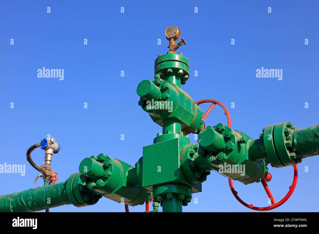 Pipe Line Hand Oil pipeline control handwheel under the blue sky, closeup of photo ...