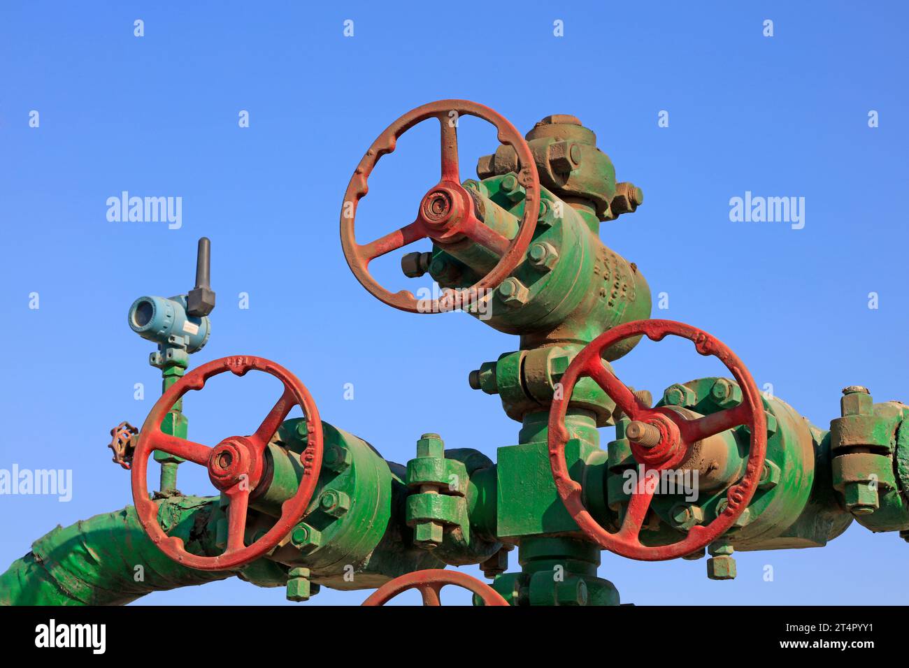 Pipe Line Hand Oil pipeline control handwheel under the blue sky, closeup of photo ...